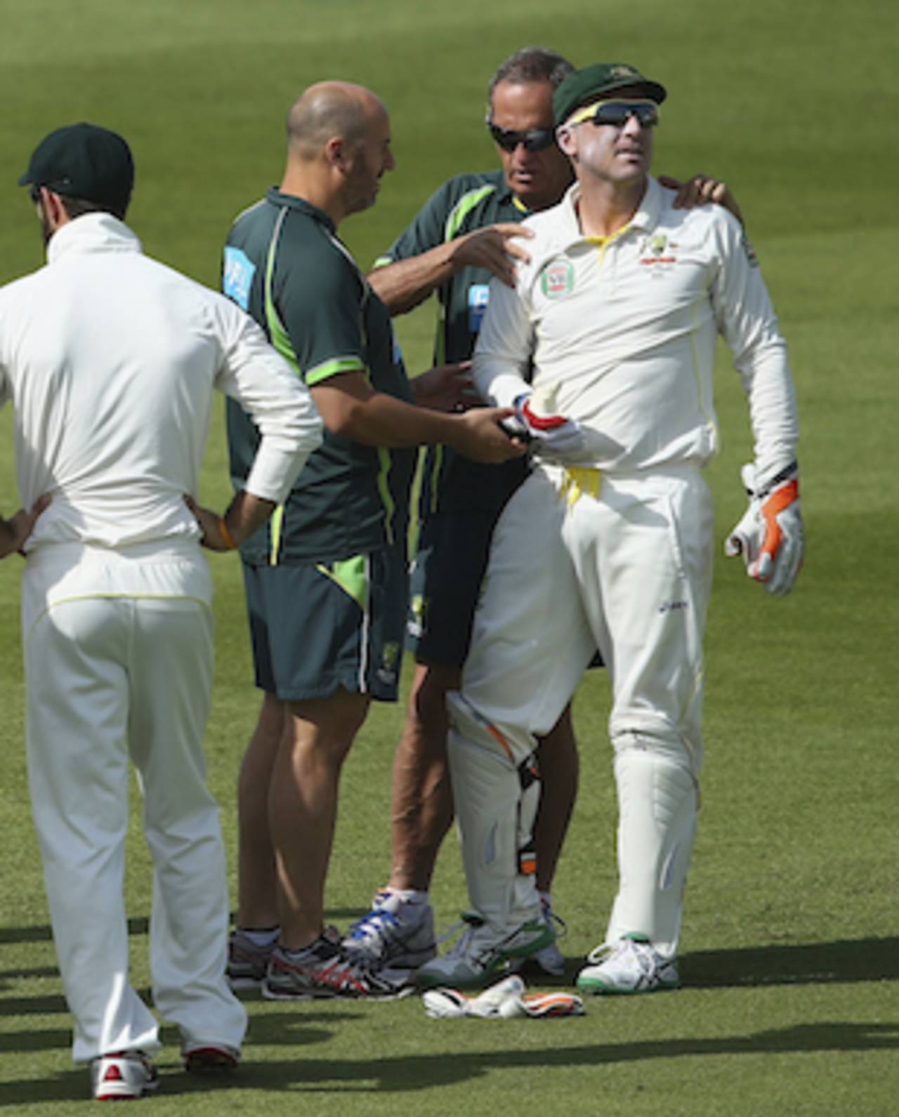 Brad Haddin gets his shoulder checked by Alex Kountouris and Peter Brukner, Pakistan v Australia, 2nd Test, Abu Dhabi, 2nd day, October 31, 2014