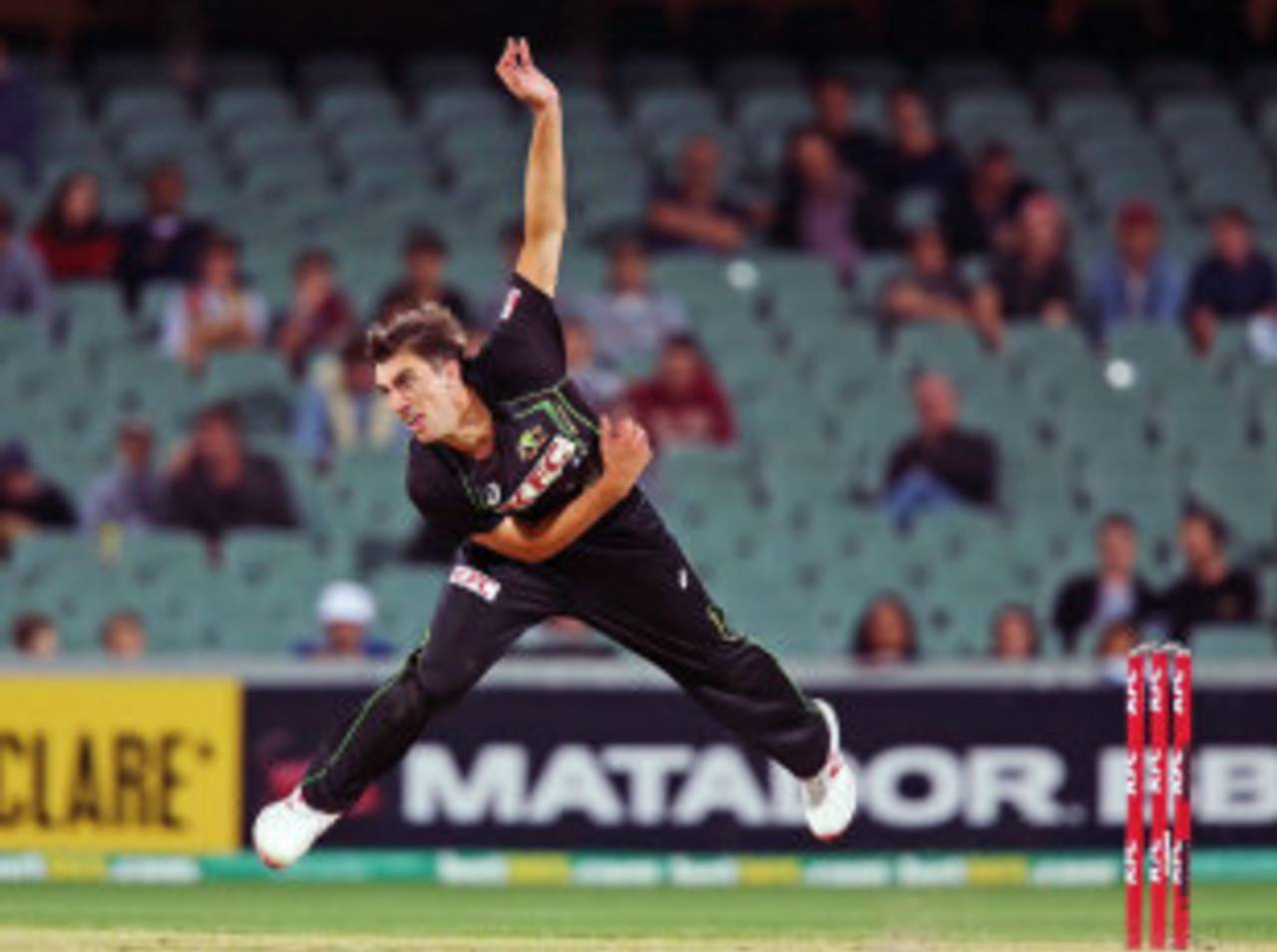 Pat Cummins in his follow-through, Australia v South Africa, 1st Twenty20, Adelaide, November 5, 2014