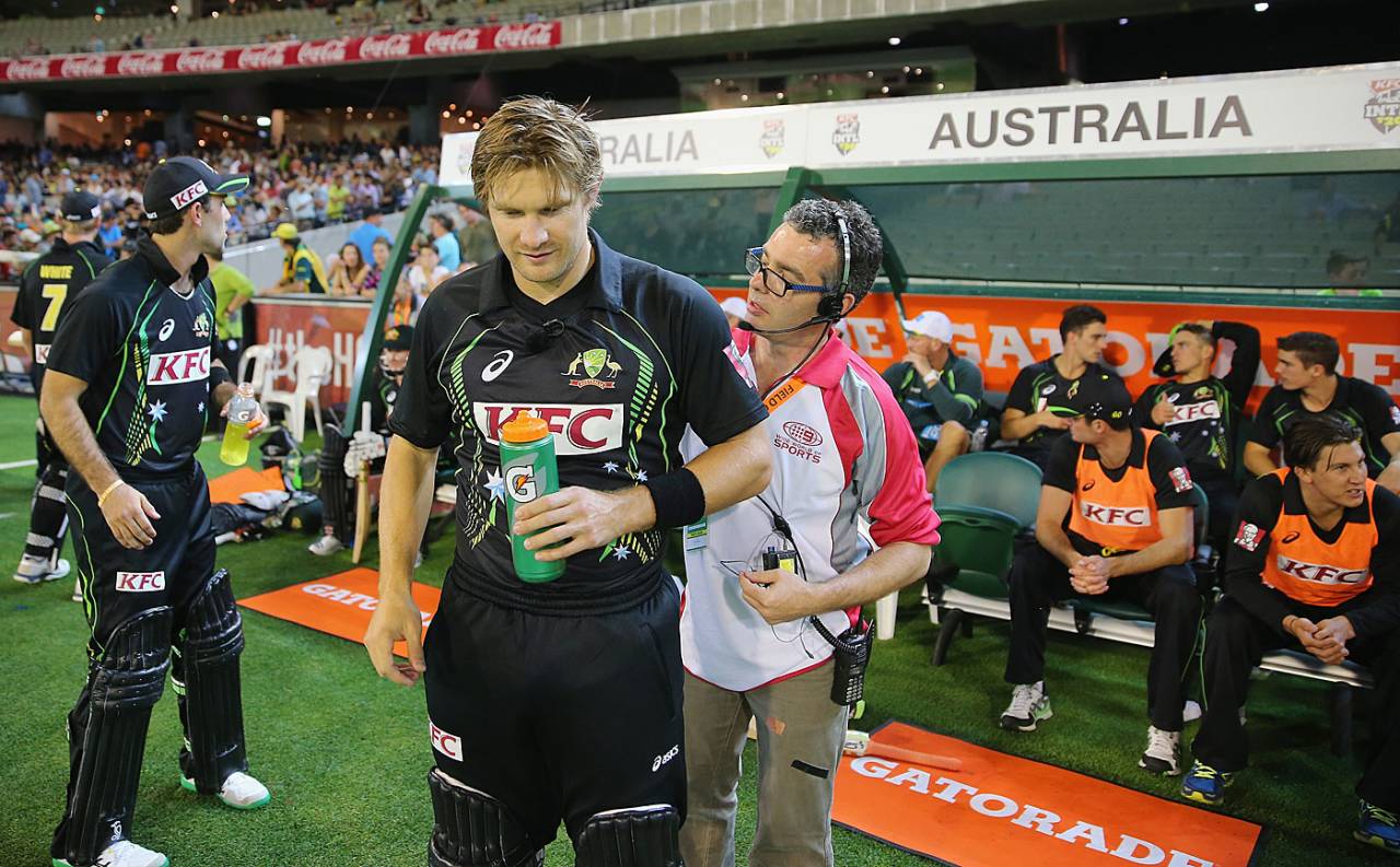 Shane Watson is miked up by the television crew before going out to bat, Australia v South Africa, 2nd T20, Melbourne, November 7, 2014