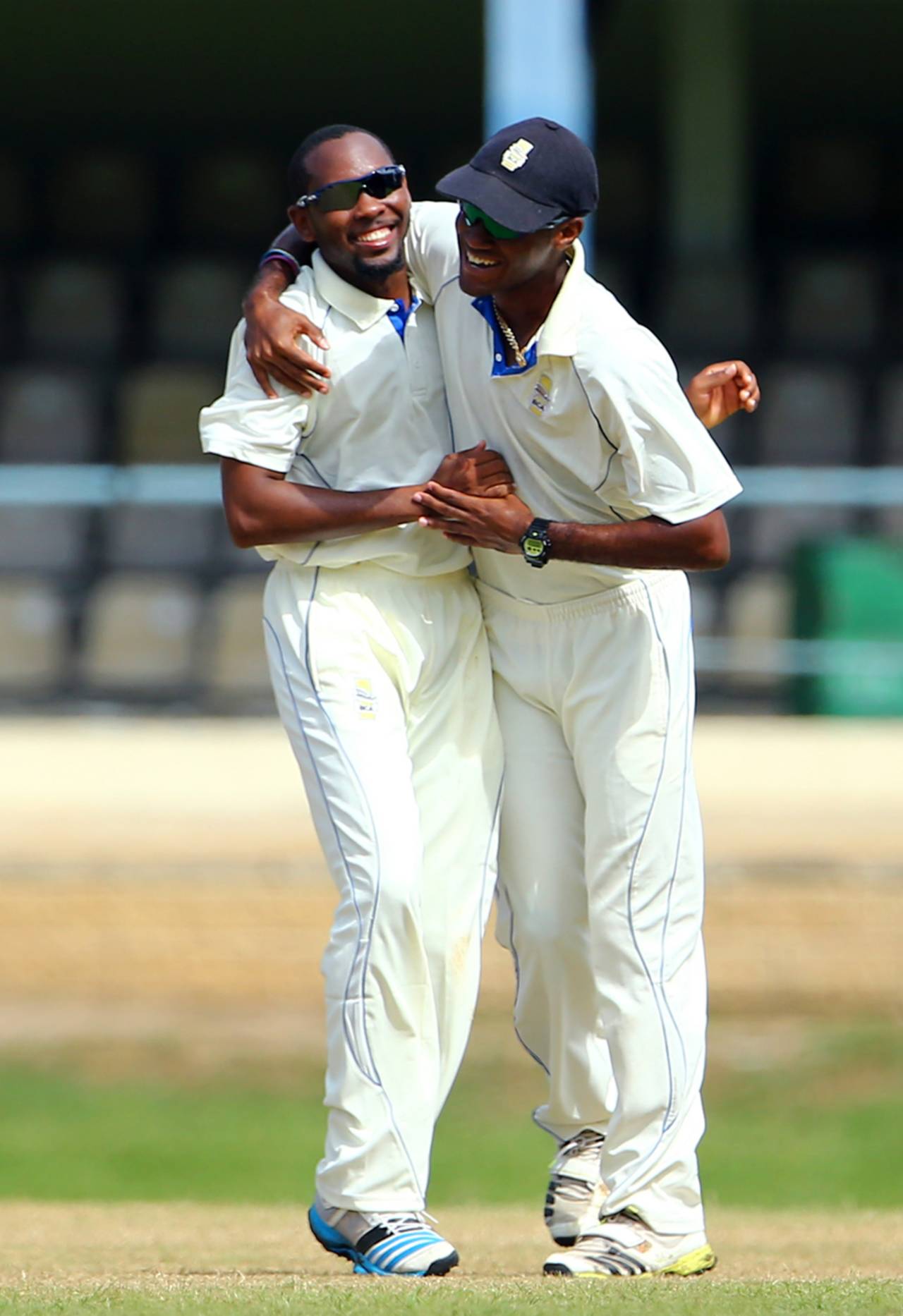 Jomel Warrican and Kraigg Brathwaite celebrate a wicket, Trinidad & Tobago v Barbados, Professional Cricket League 2014-15, Port of Spain, 3rd day, November 16, 2014