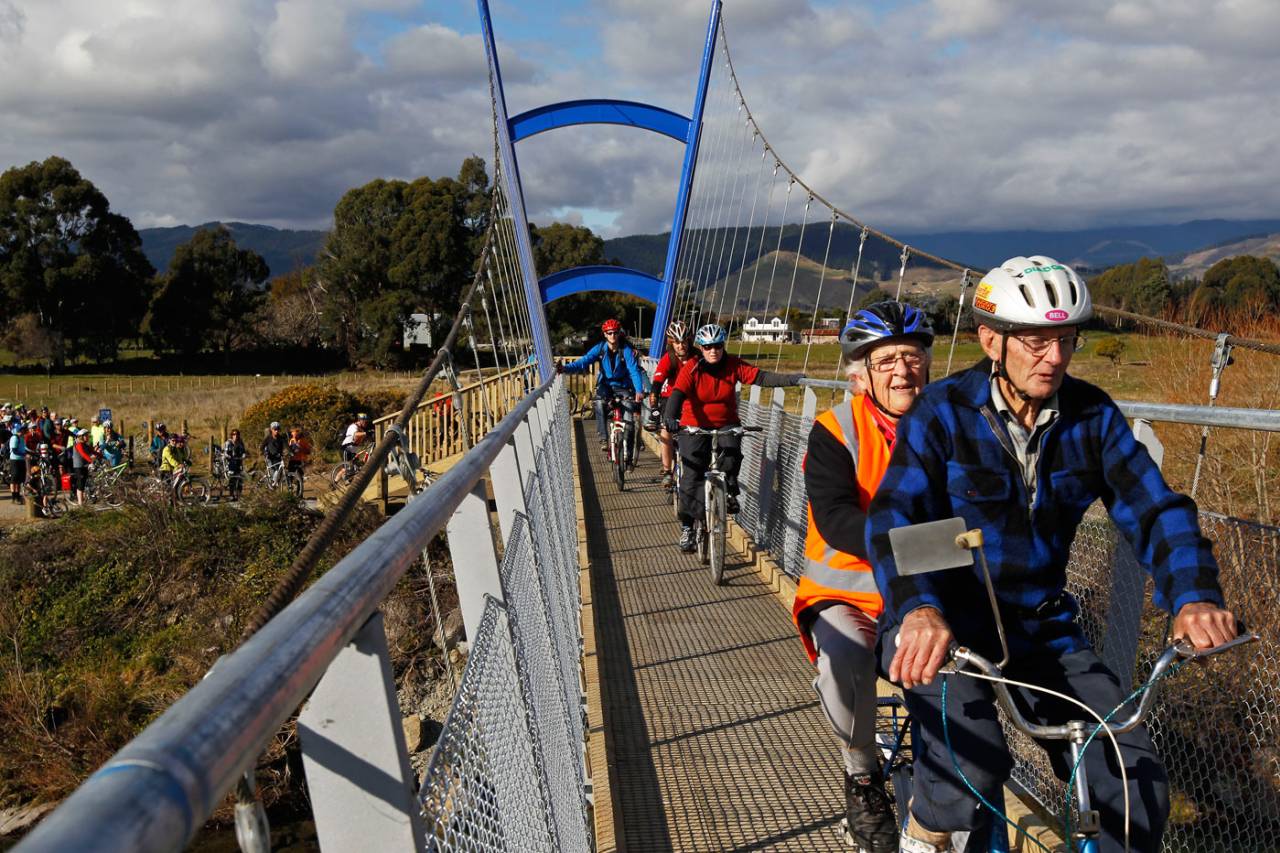 A group of cyclists celebrates the opening of a new purpose-built bridge across the Waimea River, which links Nelson city to Wakefield&nbsp;&nbsp;&bull;&nbsp;&nbsp;Virginia Woolf/Fairfax Media
