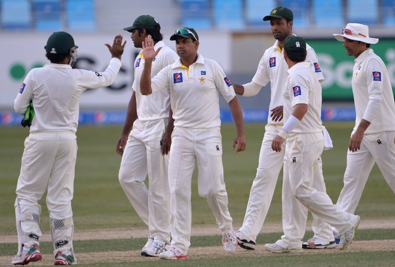 Zulfiqur Babar took the last wicket, of Trent Boult, Pakistan v New Zealand, 2nd Test, Dubai, 2nd day, November 18, 2014