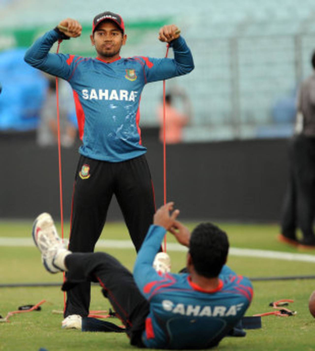Mushfiqur Rahim stretches during a training session, Chittagong, November 19, 2014