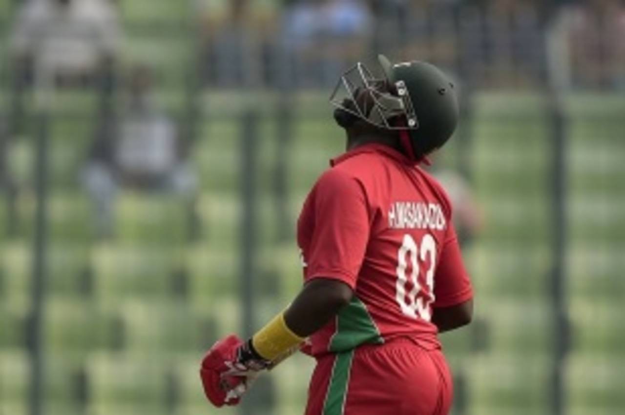 Hamilton Masakadza looks up after reaching his fifty, Bangladesh v Zimbabwe, 5th ODI, Mirpur, December 1, 2014