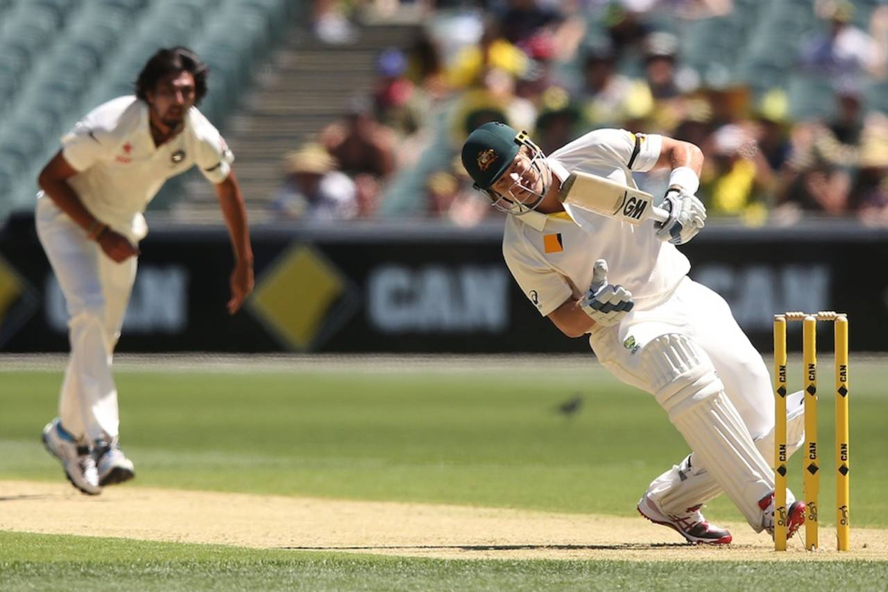 Shane Watson avoids a bouncer from Ishant Sharma, Australia v India, 1st Test, Adelaide, 1st day, December 9, 2014