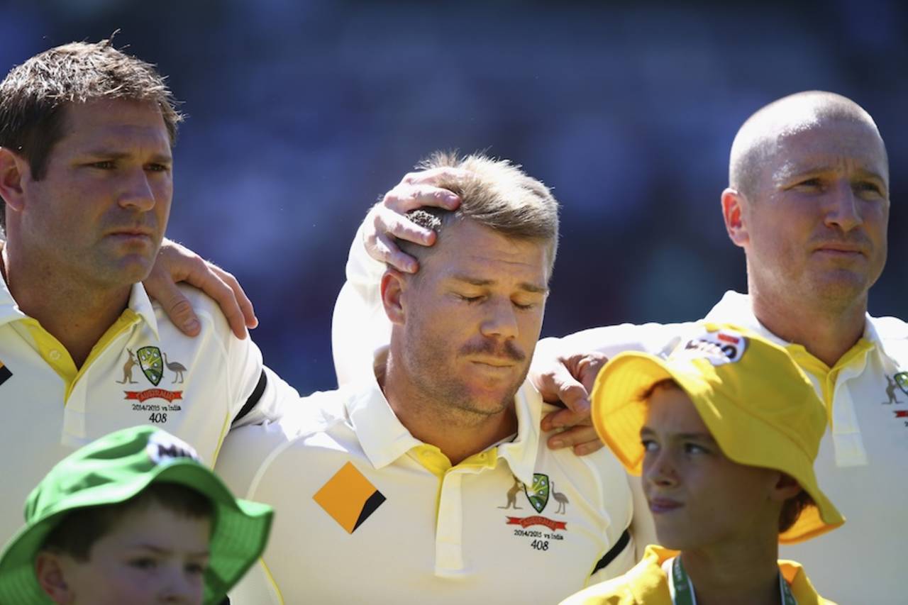 Brad Haddin puts a consoling hand on David Warner's head during the tribute to Phillip Hughes, Australia v India, 1st Test, Adelaide, 1st day, December 9, 2014