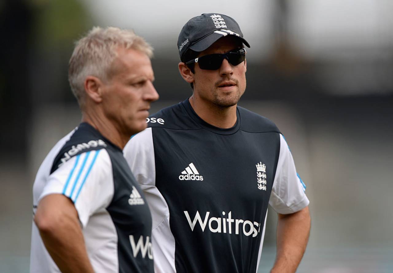 Much to ponder: Alastair Cook and Peter Moores watching England's net session, Colombo, December 15, 2014