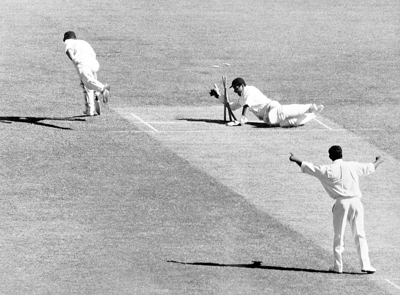 Farokh Engineer breaks the stumps as Ian Redpath makes his ground, Victoria v Indians, tour match, MCG, 1st day, December 8, 1967