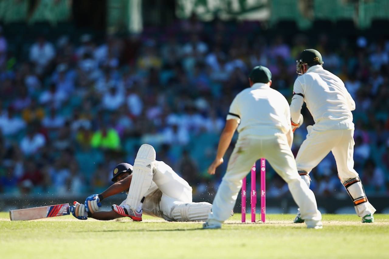 Rohit Sharma falls over as he tries to sweep, Australia v India, 4th Test, Sydney, 2nd day, January 7, 2015