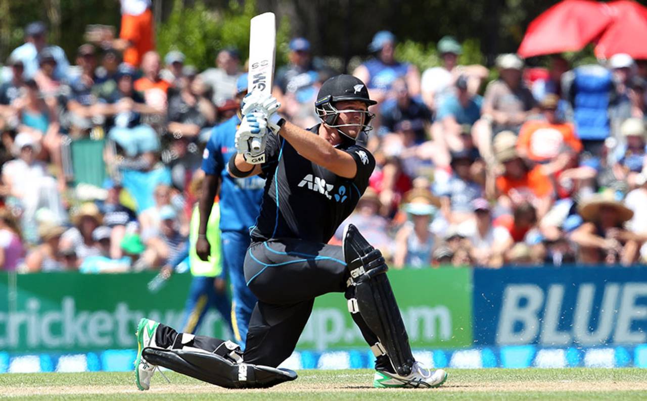 Corey Anderson plays a slog-sweep, New Zealand v Sri Lanka, 6th ODI, Dunedin, January 25, 2015