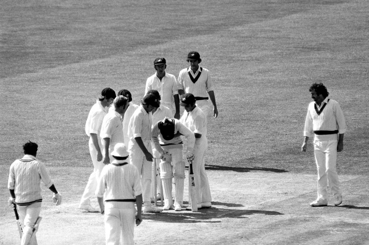 The Australian players gather around Sunil Wettimuny after he was struck in the chest by a Jeff Thomson delivery, Australia v Sri Lanka, World Cup, The Oval, June 11, 1975