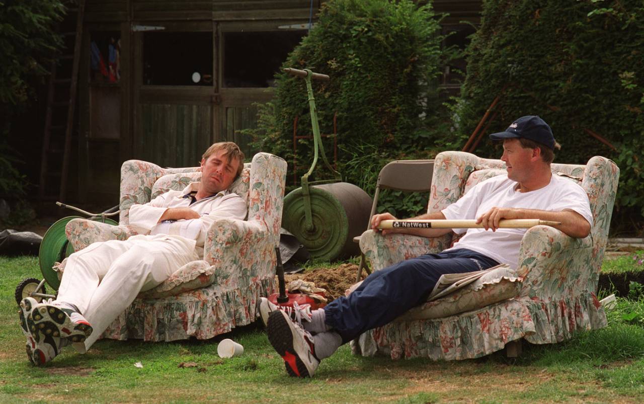 Phil Tufnell and Mike Roseberry relax on armchairs in the sidelines of a county game in Southgate
