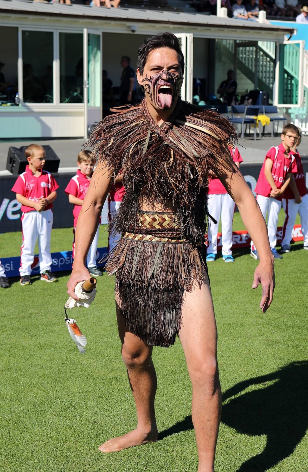 A person dressed as a Maori warrior strikes a fierce pose, World Cup 2015, Group A, Dunedin, February 17, 2015