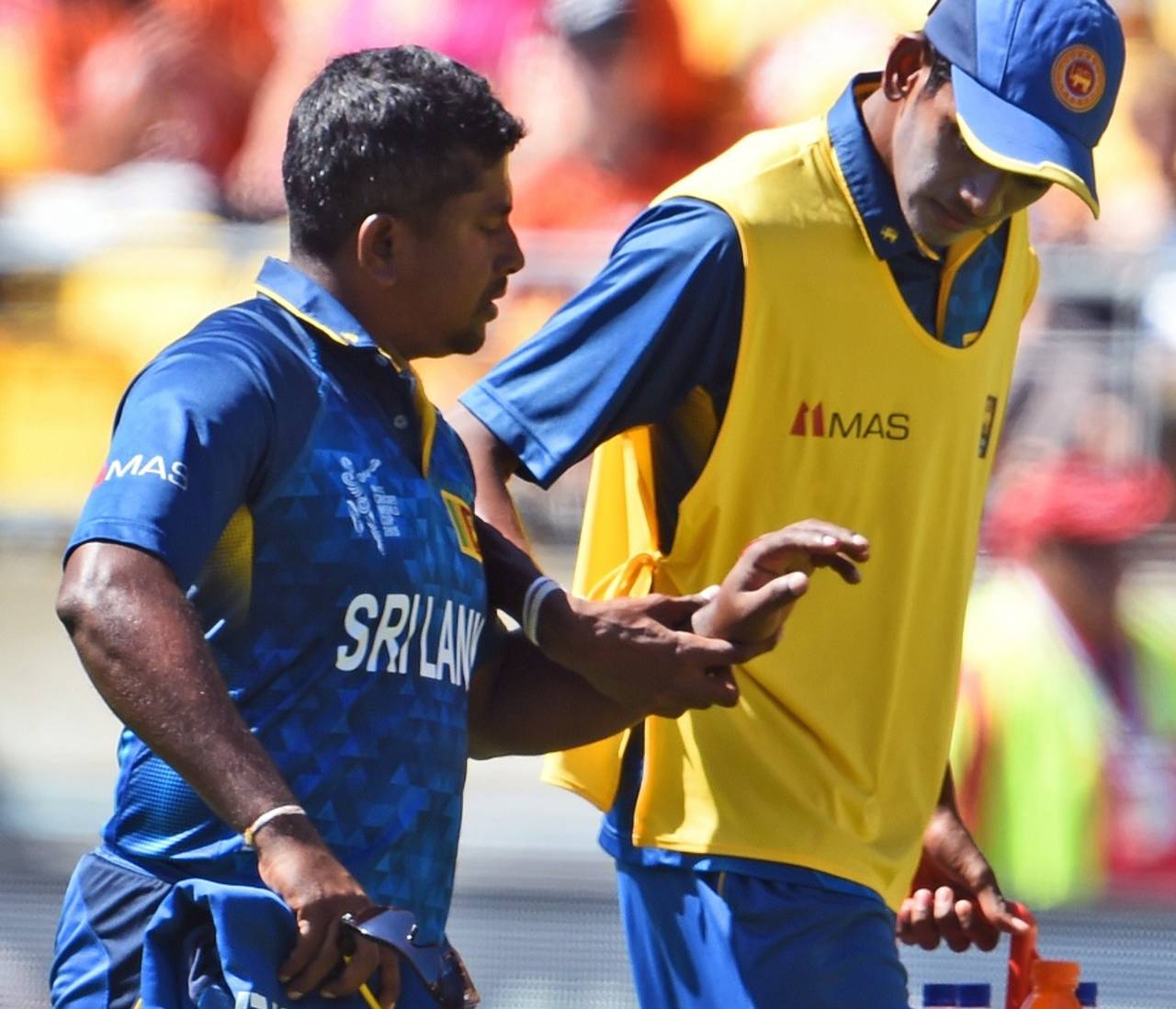 Rangana Herath left the field in the penultimate over of England's innings after being struck on the finger&nbsp;&nbsp;&bull;&nbsp;&nbsp;AFP