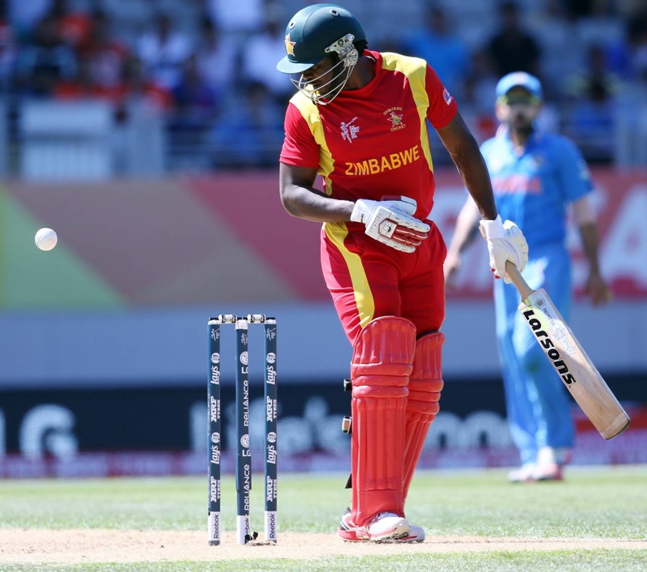 Solomon Mire watches the ball bounce over the stumps after inside-edging it, India v Zimbabwe, World Cup 2015, Group B, Auckland, March 14, 2015