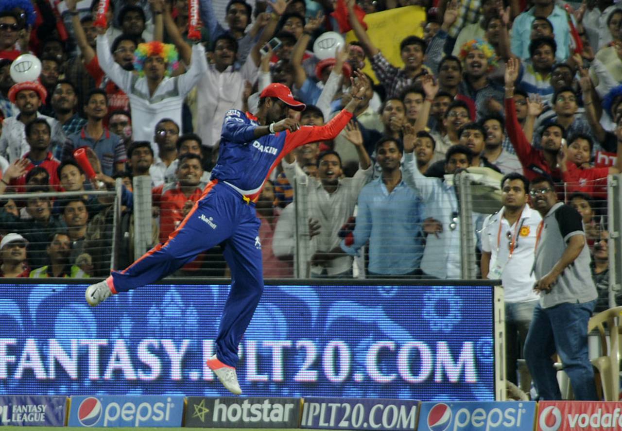 Domnic Muthuswami makes a valiant attempt to stop a boundary, Kings XI Punjab v Delhi Daredevils, IPL 2015, Pune, April 15, 2015