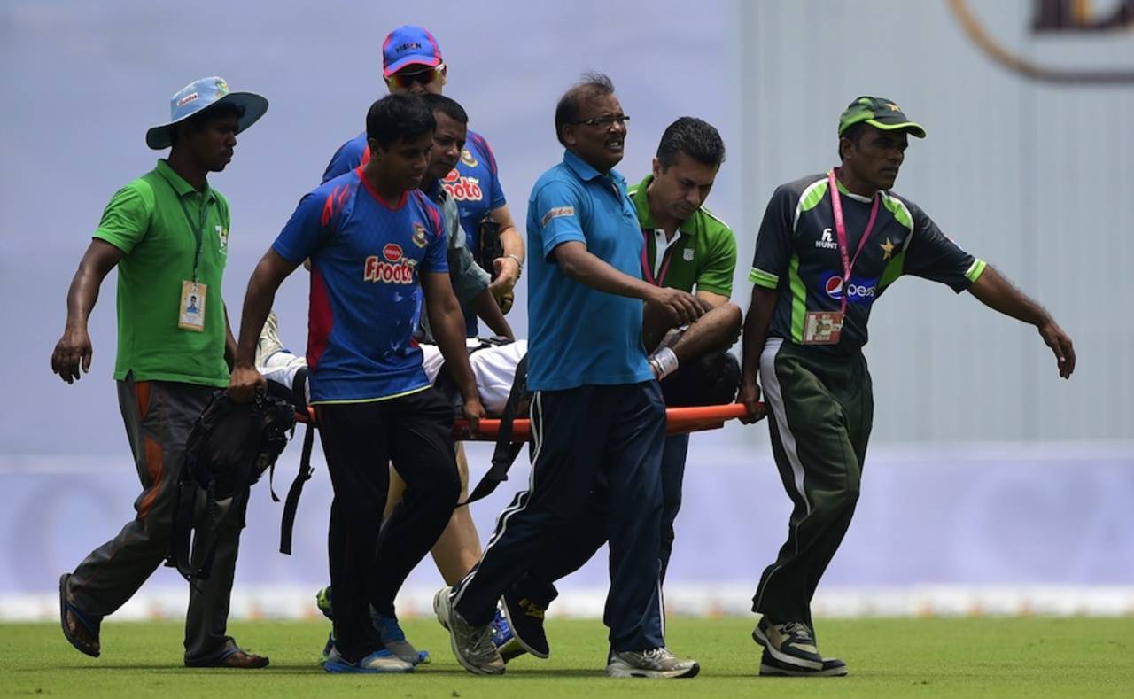 Shahadat Hossain had to be stretchered off the field during the lunch break&nbsp;&nbsp;&bull;&nbsp;&nbsp;AFP