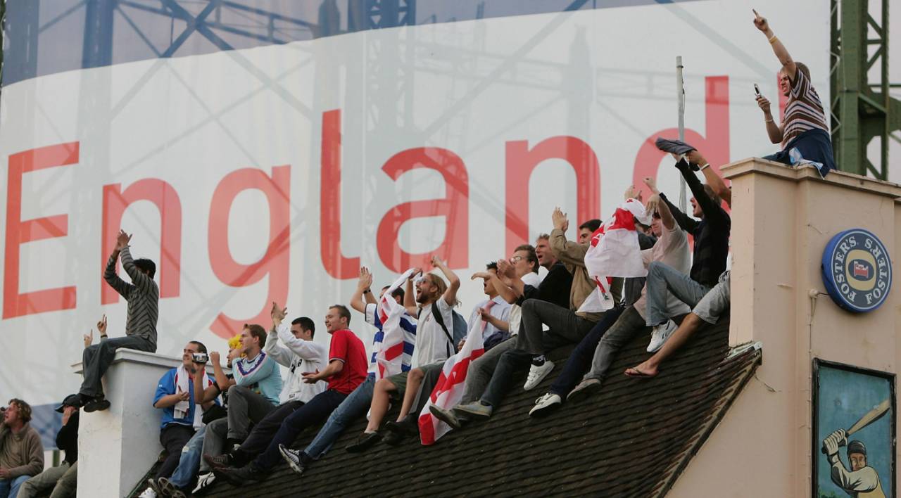 Fans applaud from a rooftop overlooking the ground, England v Australia, fifth Test, fifth day, The Oval, September 12, 2005