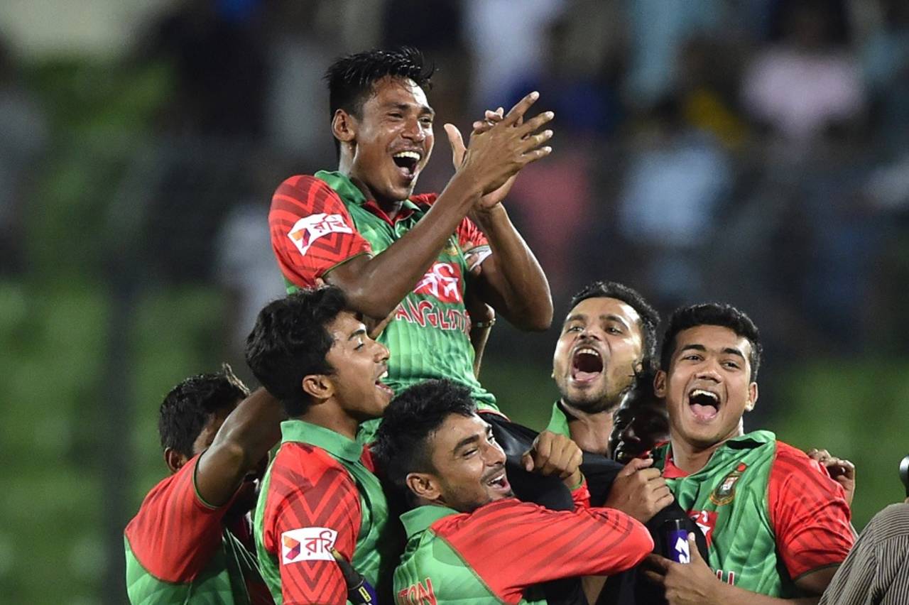 The new hero: Mustafizur Rahman is hoisted by his team-mates, Bangladesh v India, 2nd ODI, Mirpur, June 21, 2015