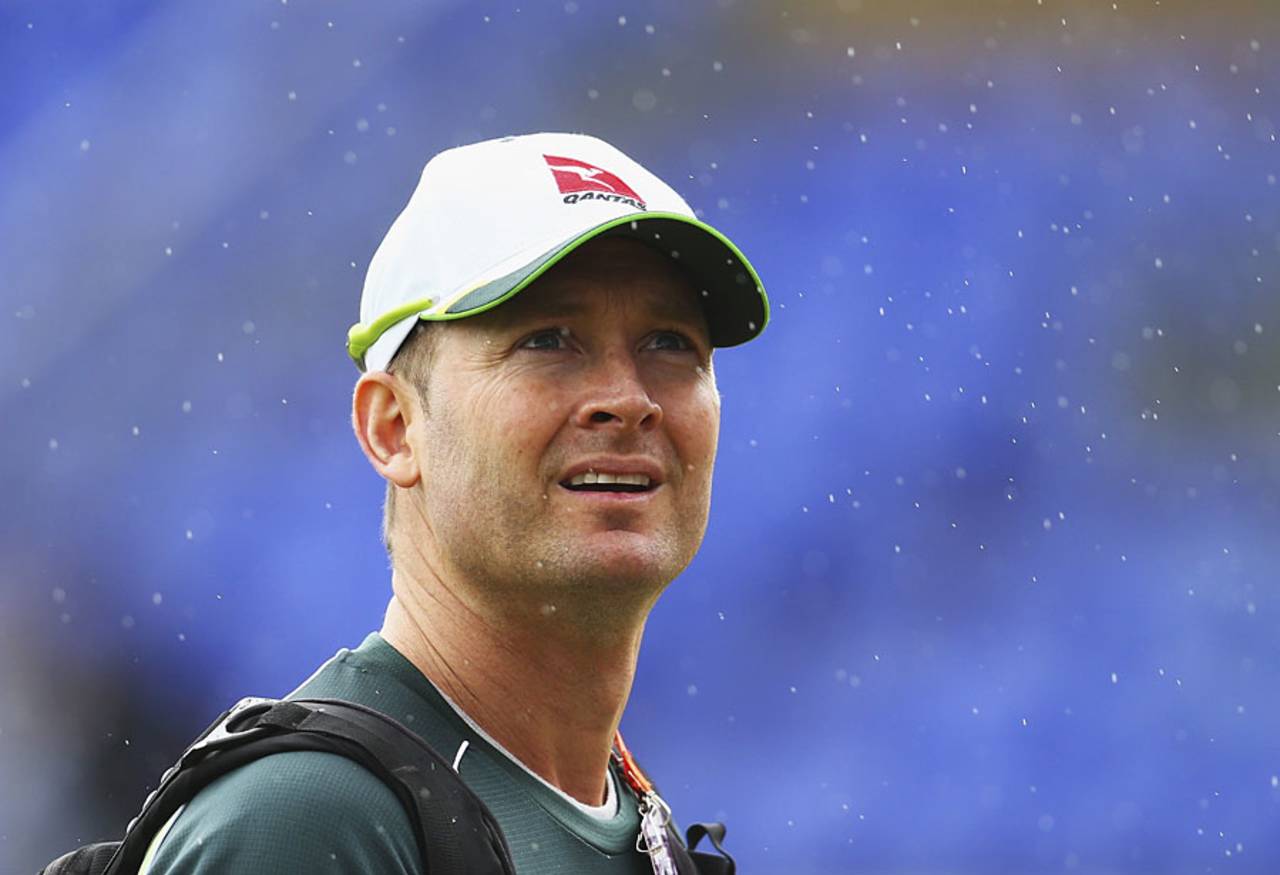Michael Clarke looks on amazed at the little airborne droplets of water that are an essential element of any summer cricket series in England&nbsp;&nbsp;&bull;&nbsp;&nbsp;Getty Images