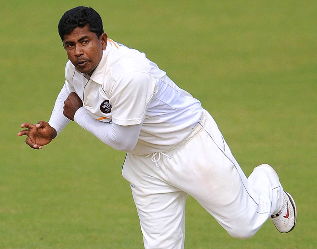 Herath bowls for Surrey in 2009, after his less than stellar stint with Moddershall earlier that summer&nbsp;&nbsp;&bull;&nbsp;&nbsp;PA Photos