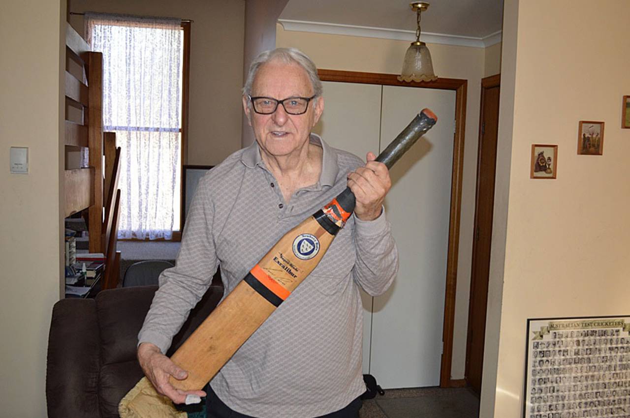 John Guy poses with the Excalibur bat used by Lance Cairns, Melbourne, September 2015