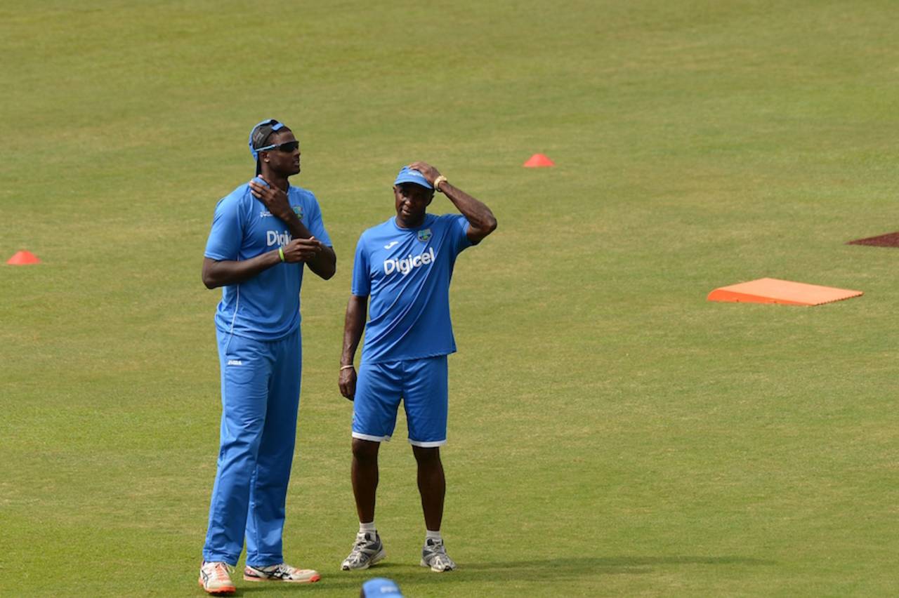 West Indies coach Eldine Baptiste and captain Jason Holder have a chat, Sri Lanka v West Indies, 1st ODI, Colombo, November 1, 2015 