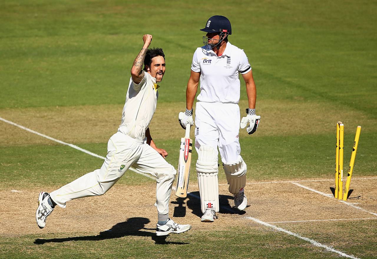 Mitchell Johnson celebrates as a shell-shocked Alastair Cook looks on, Australia v England, 2nd Test, Adelaide, 2nd day, December 6, 2013