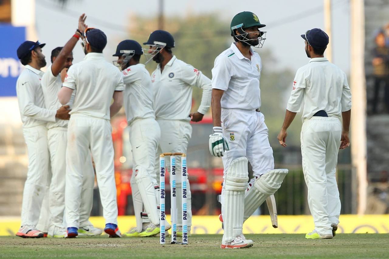 Imran Tahir walks back after Amit Mishra trapped him lbw, India v South Africa, 3rd Test, Nagpur, 2nd day, November 26, 2015