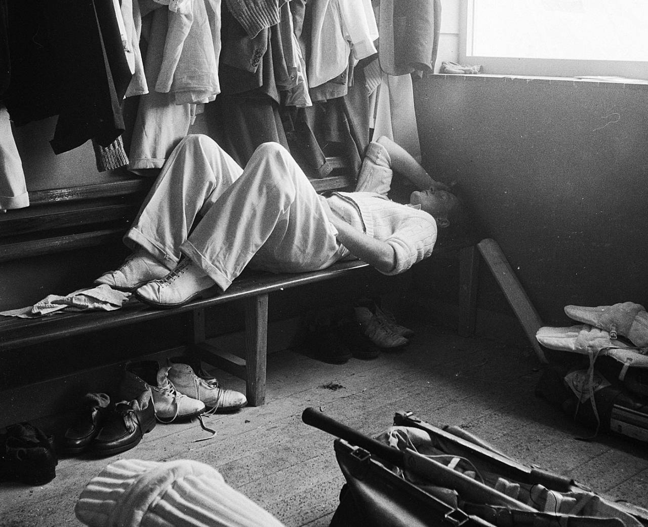 Peter Richardson takes a nap in the dressing room, England, May 25, 1956