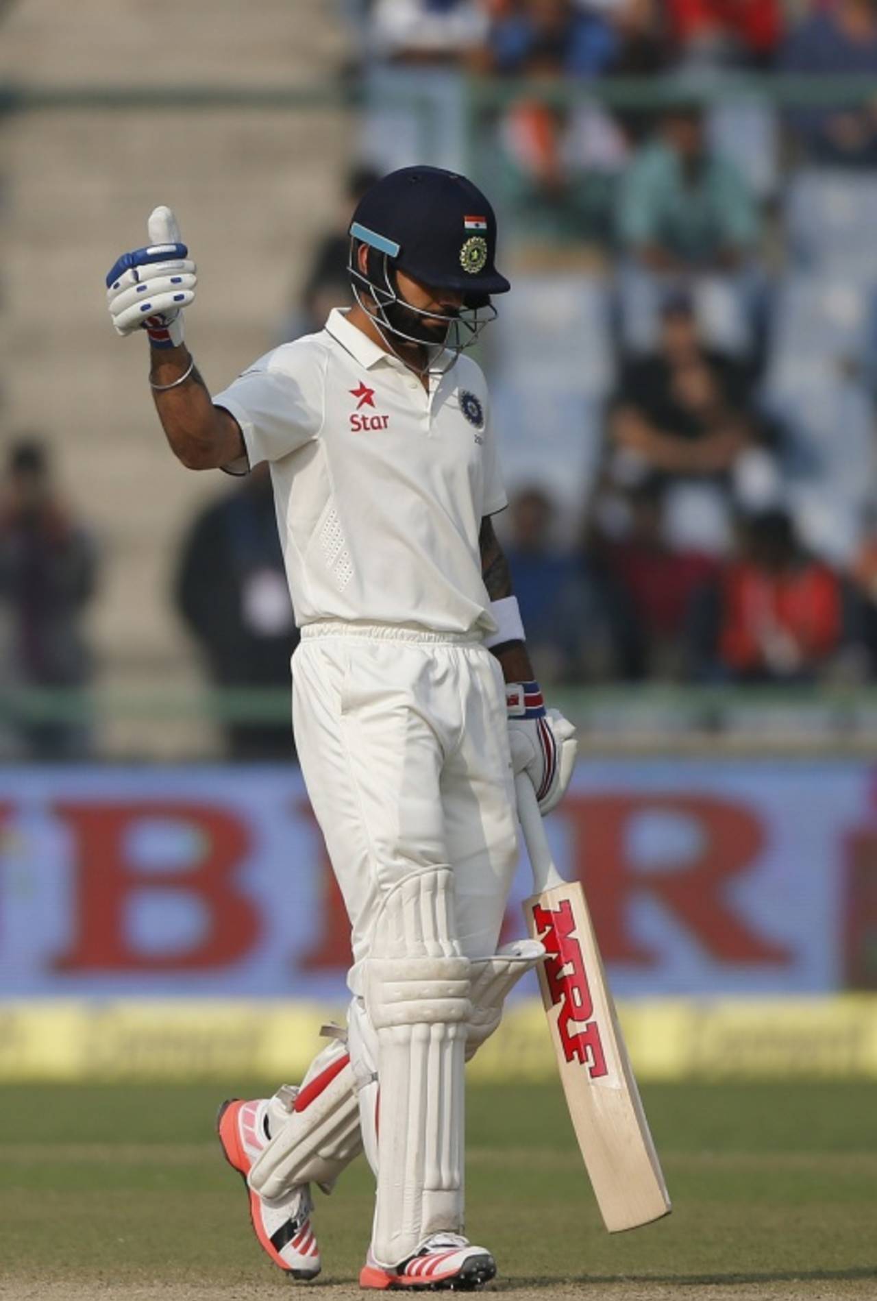 Virat Kohli acknowledges the cheers after reaching his first fifty in the series, India v South Africa, 4th Test, Delhi, 3rd day, December 5, 2015