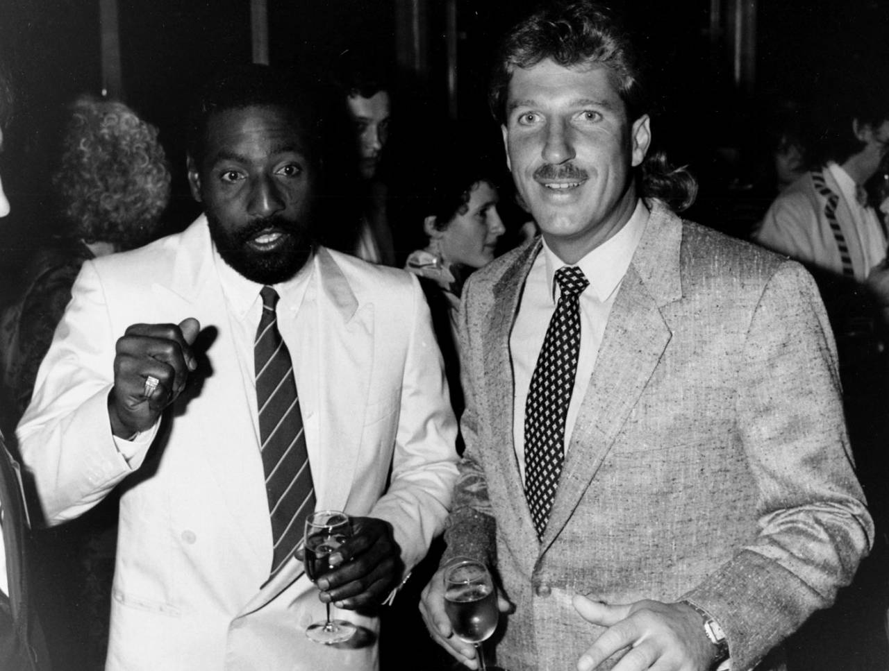 Viv Richards and Ian Botham attend a party, May 30, 1986