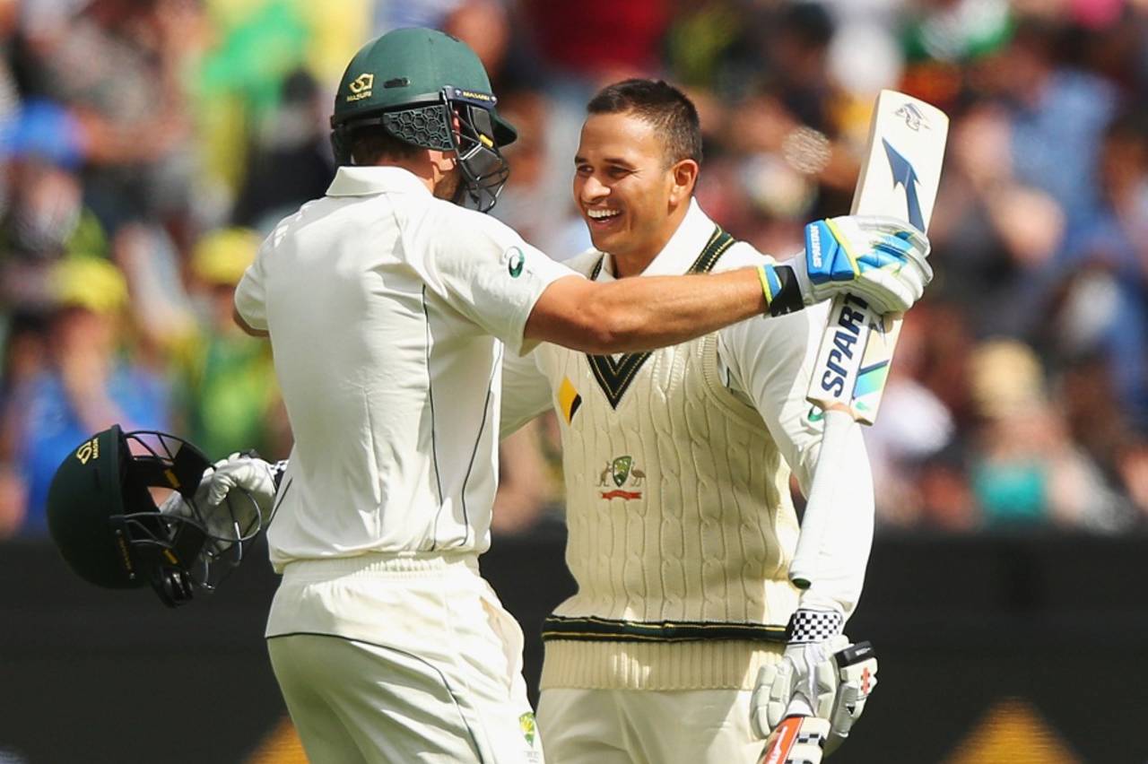 Usman Khawaja celebrates his hundred with Joe Burns , Australia v West Indies, 2nd Test, 1st day, Melbourne, December 26, 2015