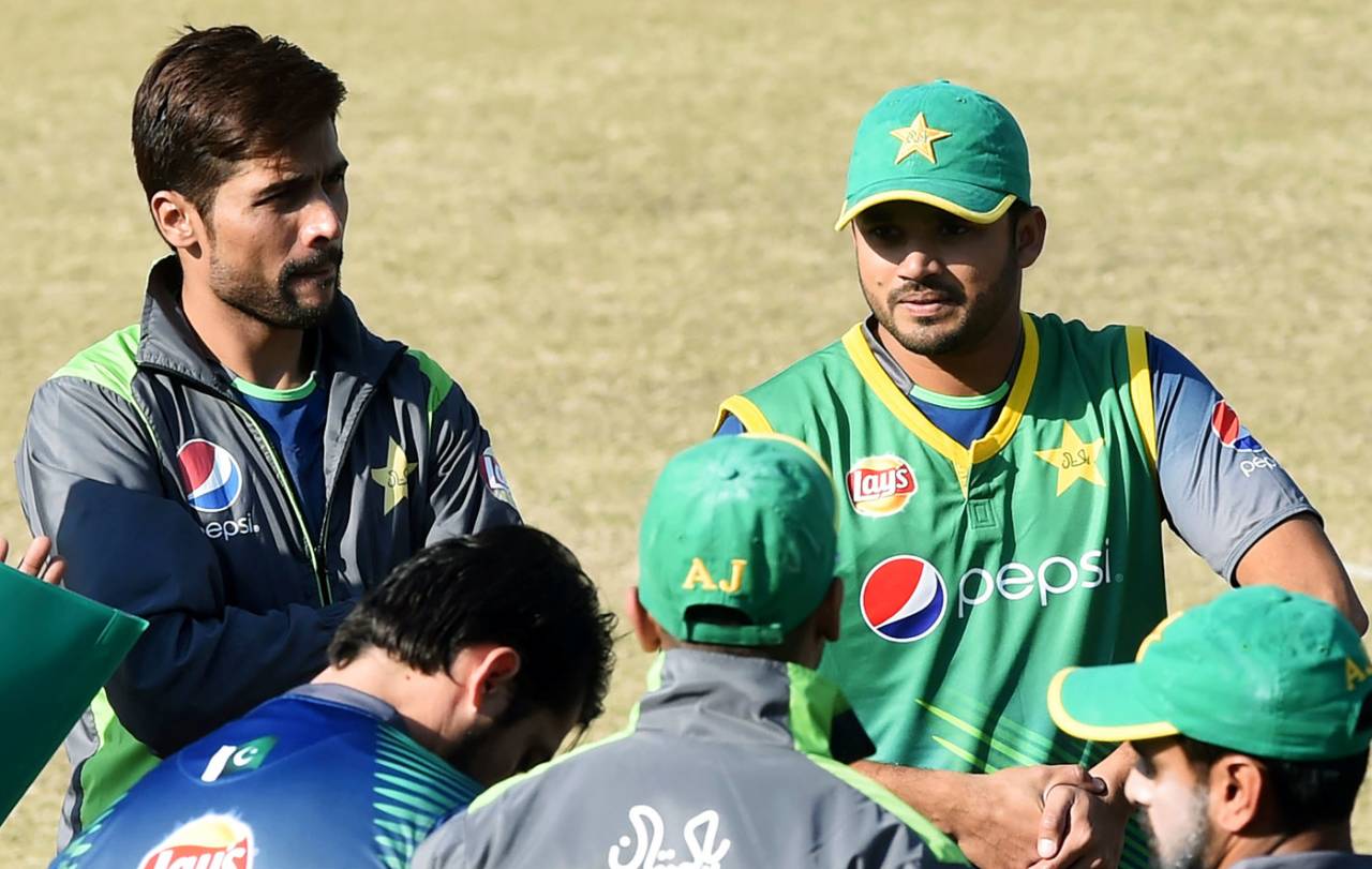 Mohammad Amir and Azhar Ali look on during a training camp, Lahore, December 29, 2015