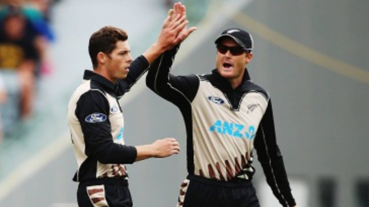 Mitchell Santner and Martin Guptill celebrate Dinesh Chandimal's wicket, New Zealand v Sri Lanka, 2nd T20I, Auckland, January 10, 2016