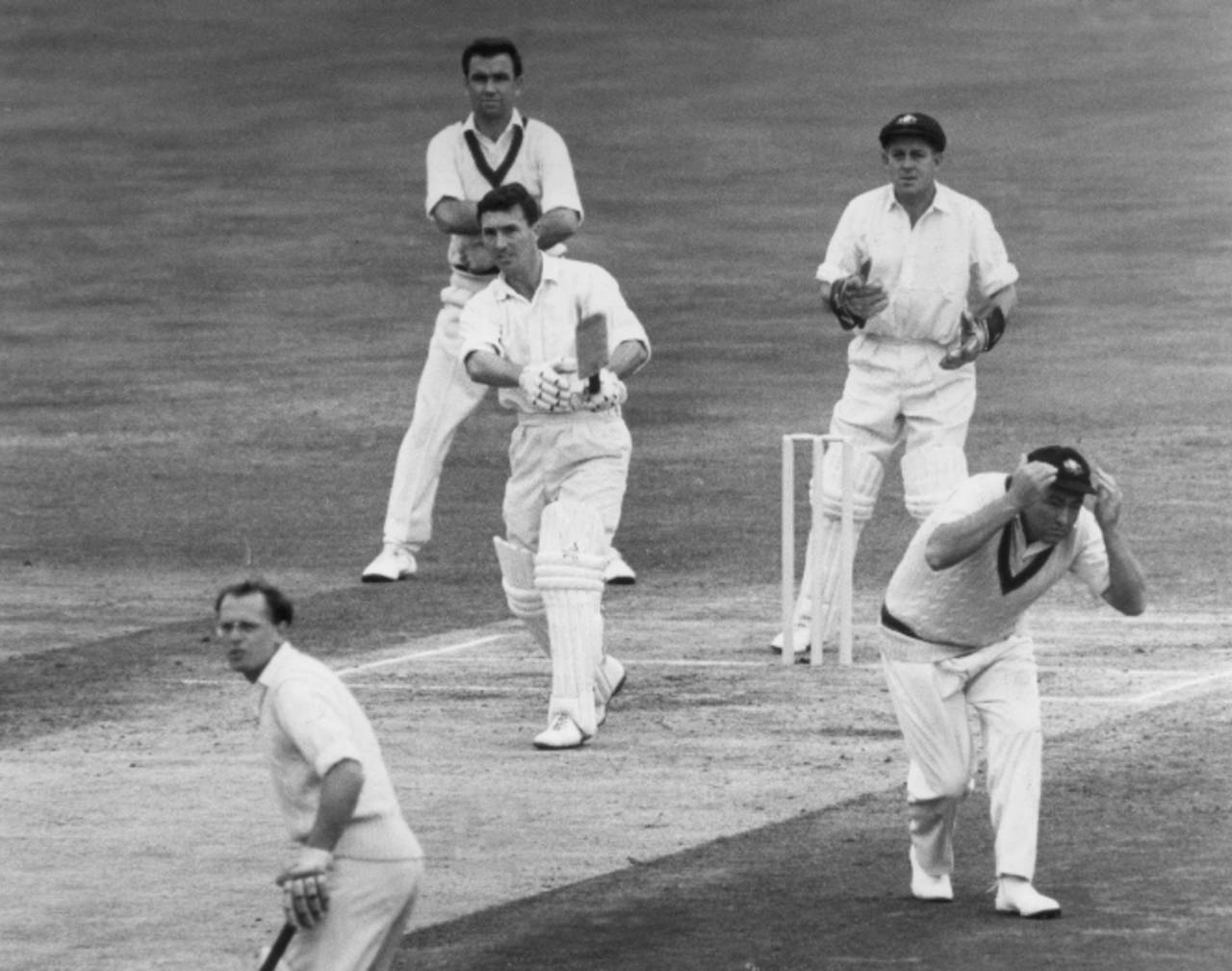 The Oval, 1964: Fred Titmus hits a six as Wally Grout, who let him off in the first Test, looks on&nbsp;&nbsp;&bull;&nbsp;&nbsp;Getty Images