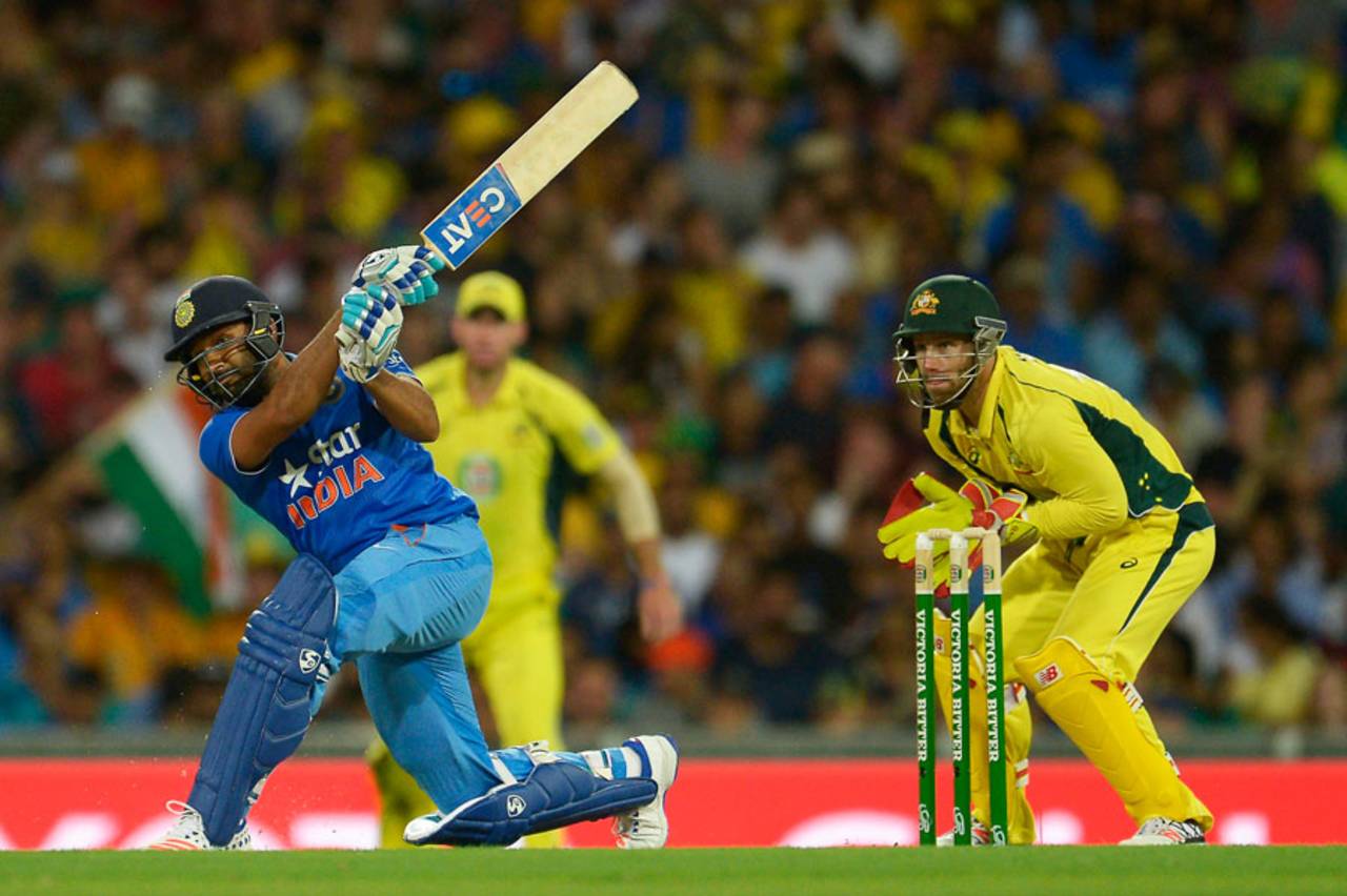 Rohit Sharma launches a slog sweep, Australia v India, 5th ODI, Sydney, January 23, 2016