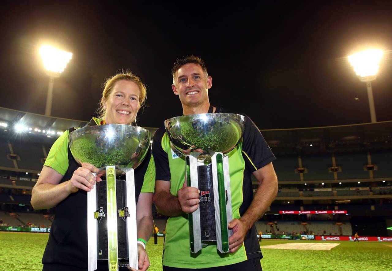 A Thunder double: Alex Blackwell and Michael Hussey pose with the WBBL and BBL trophies, Melbourne, January, 24, 2016