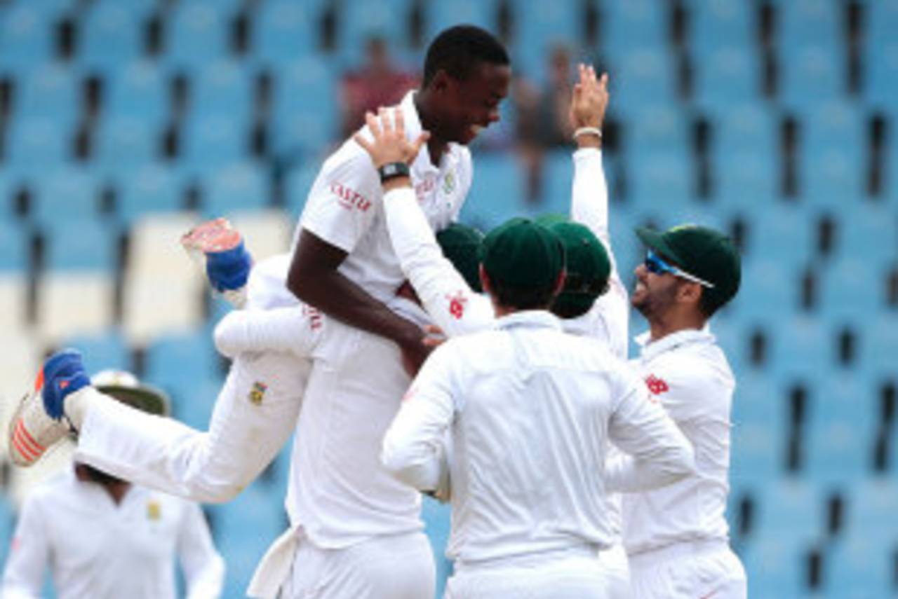 Kagiso Rabada gets hoisted by his team-mates after another wicket, South Africa v England, 4th Test, Centurion, 5th day, January 26, 2016