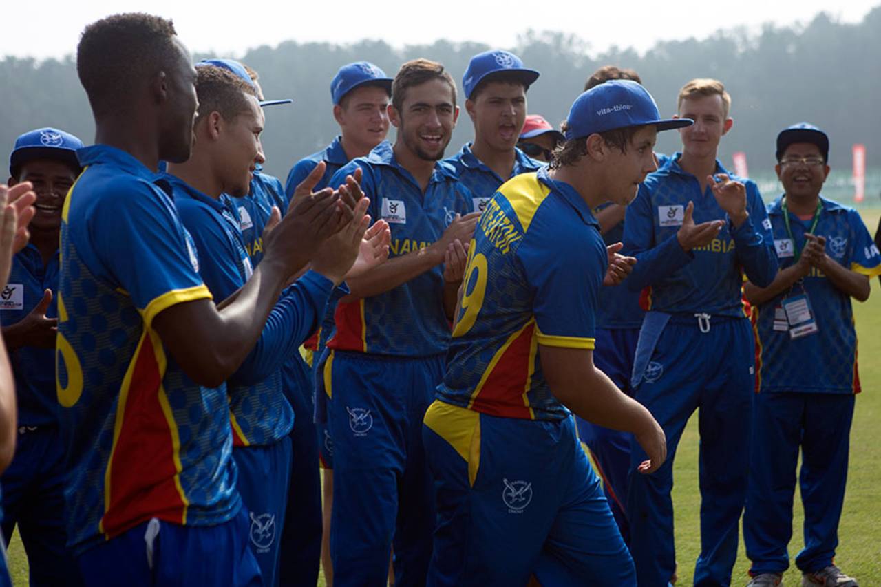 Namibia's players applaud SJ Loftie-Eaton as he goes up to accept his Player of the Match award, England v West Indies, Under-19 World Cup, Group C, January 29, 2016