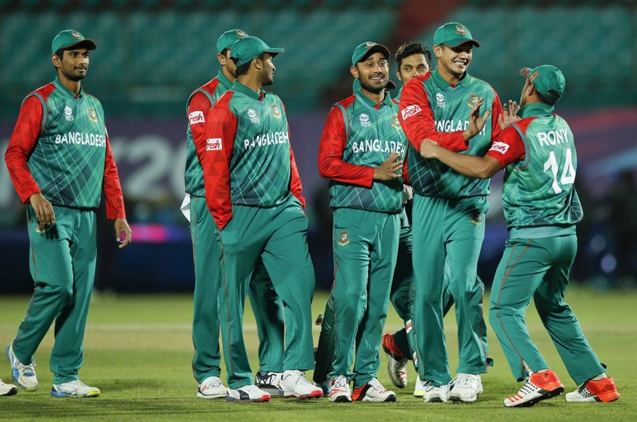 Bangladesh players celebrate their win over Oman, Bangladesh v Oman, World T20 qualifiers, Group A, Dharamsala, March 13, 2016