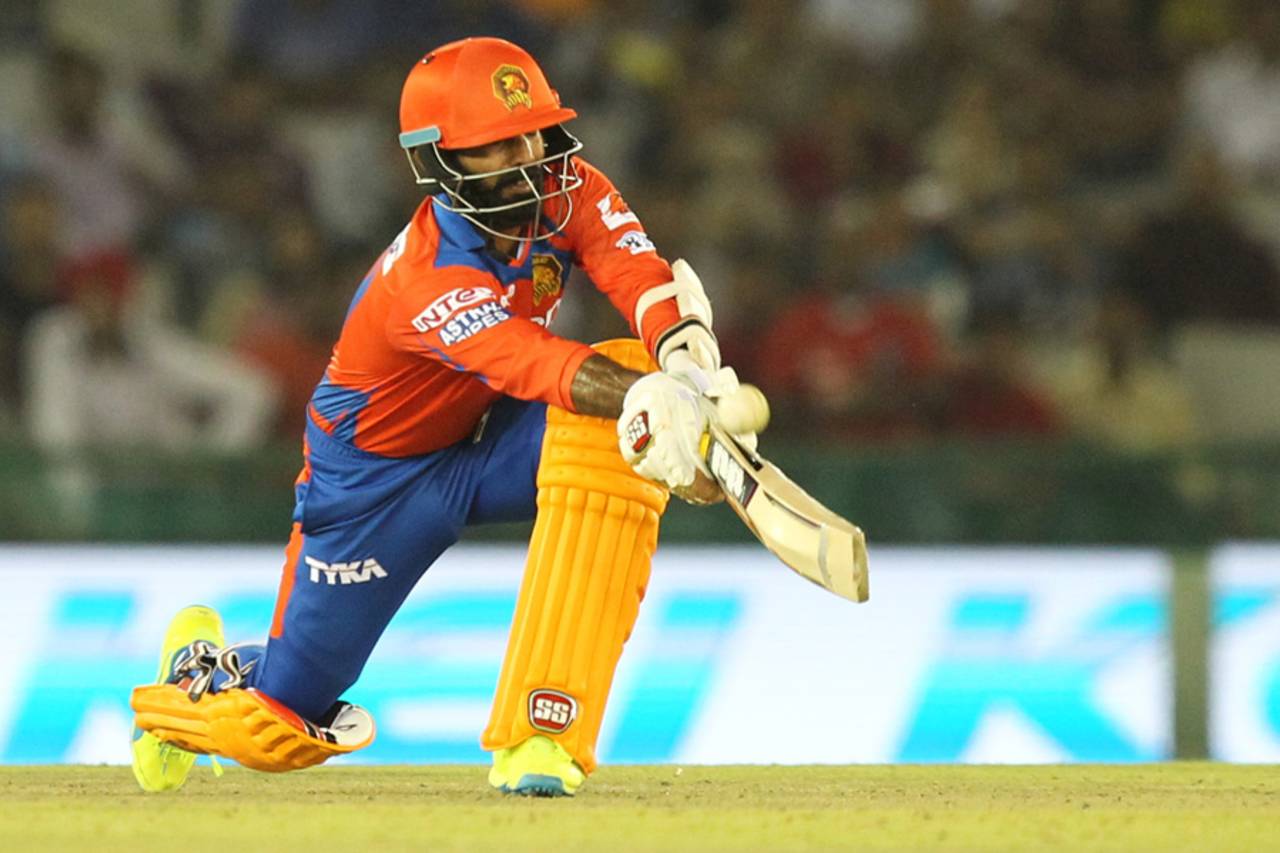 Dinesh Karthik gets down on one knee to sweep, Kings XI Punjab v Gujarat Lions, IPL 2016, Mohali, April 11, 2016