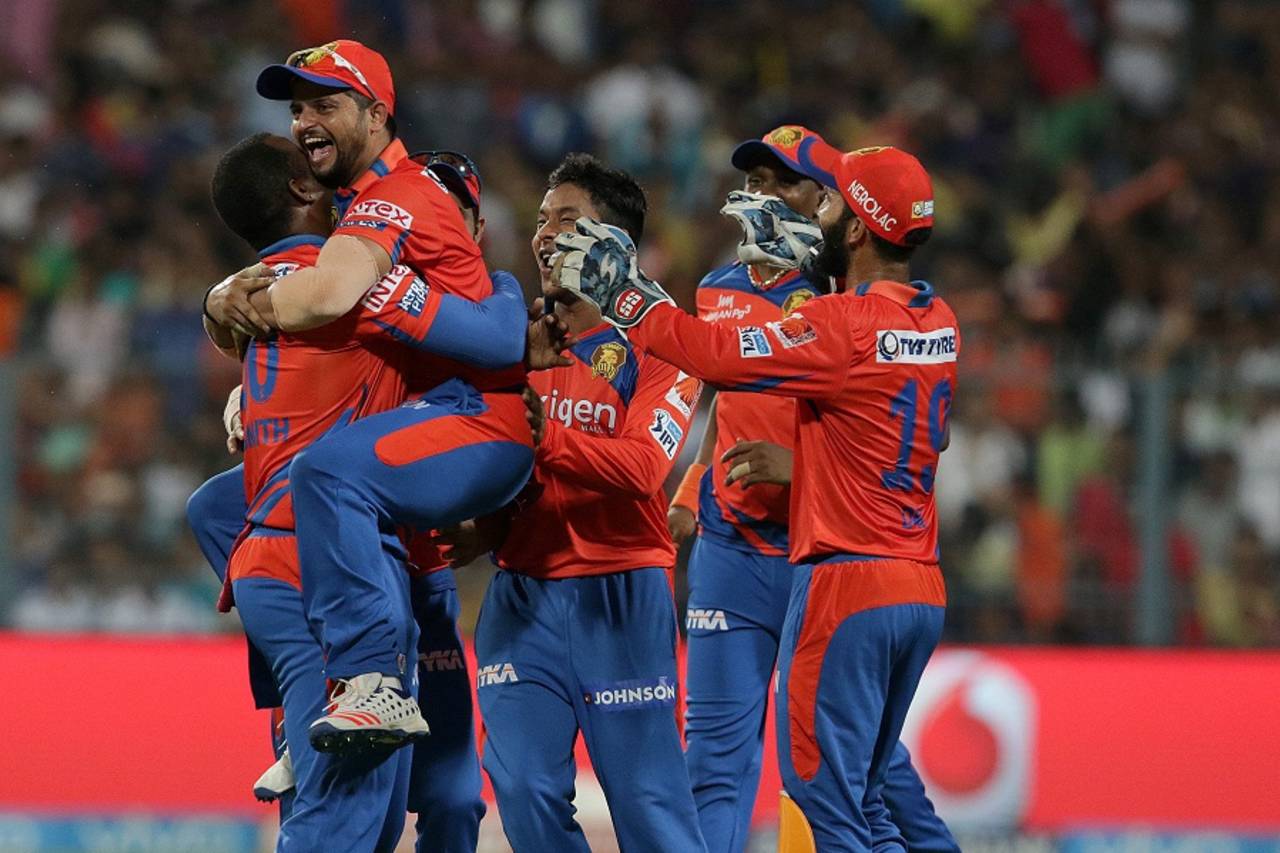 Suresh Raina is embraced by his team-mates after taking a sensational catch at slip&nbsp;&nbsp;&bull;&nbsp;&nbsp;BCCI