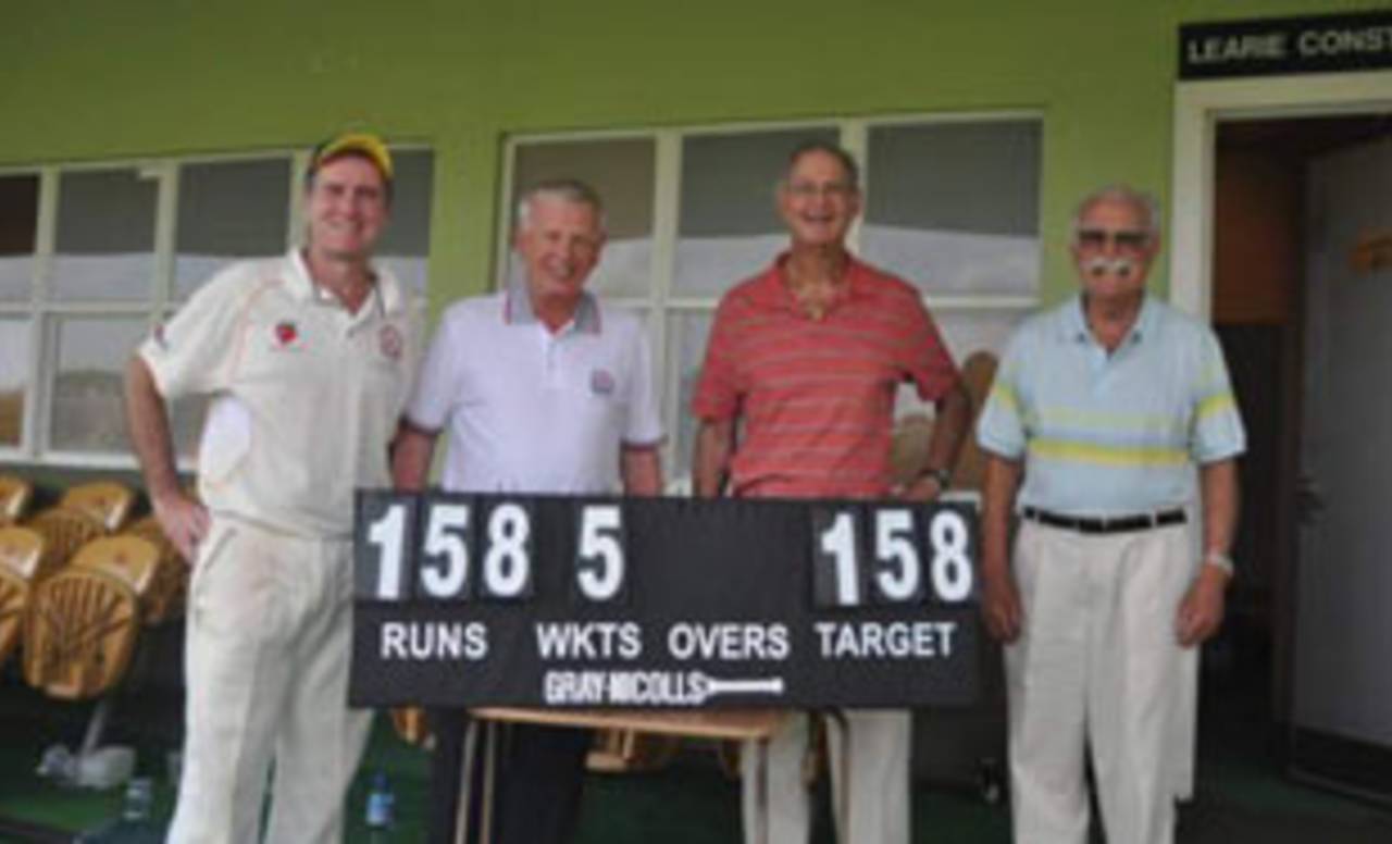 Touring members of the Craigengower Cricket Club with Tony Cozier , 2012