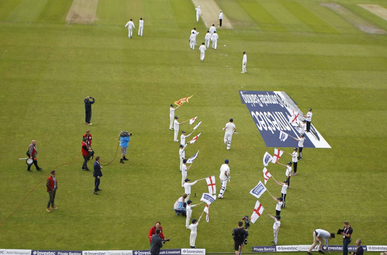 Alex Hales and Jonny Bairstow run out through a corridor of flags, England v Sri Lanka, 1st Test, Headingley, 2nd day, May 20, 2016