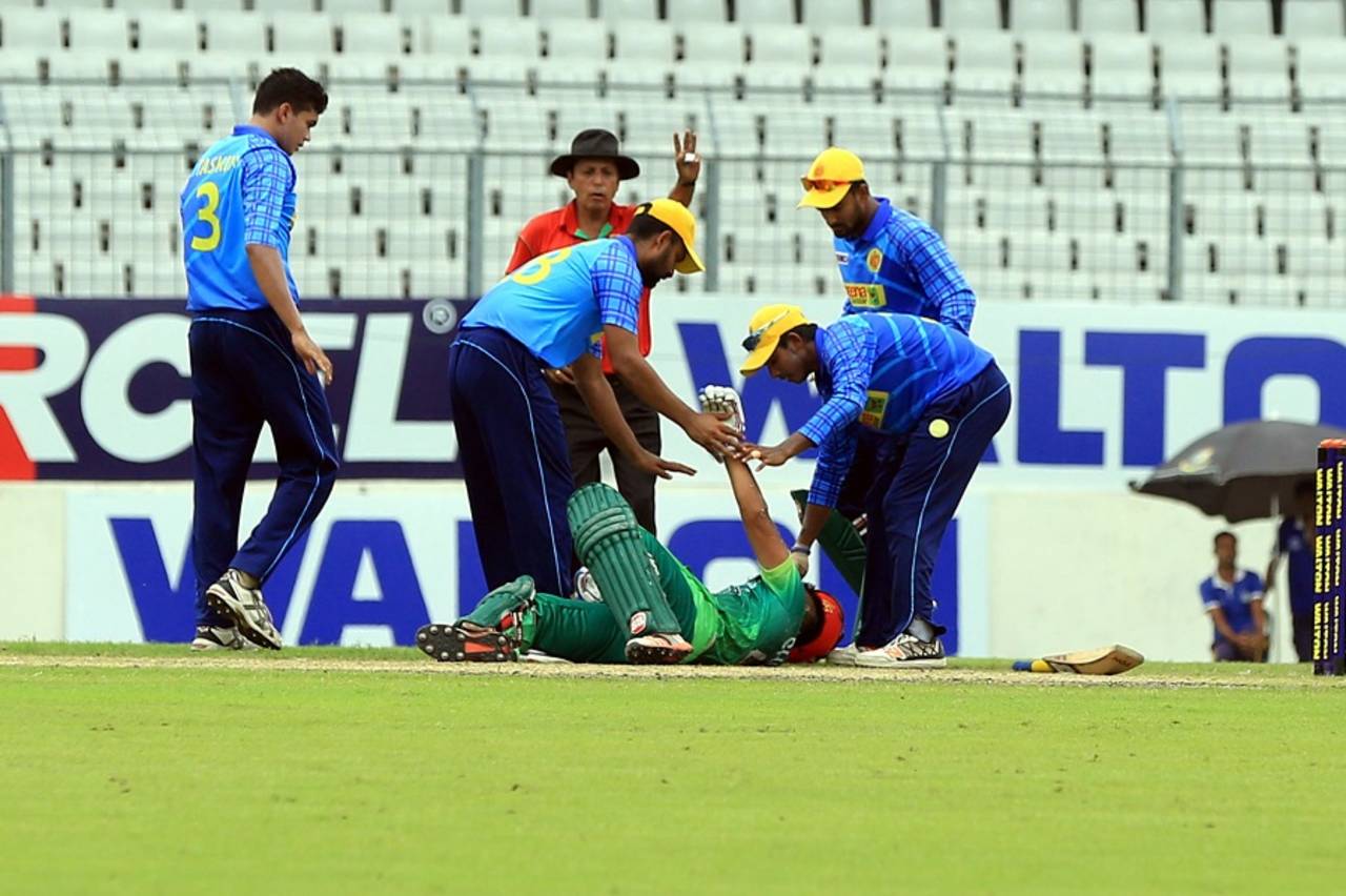 Suhrawadi Shuvo is attended to after being struck by a Taskin Ahmed bouncer&nbsp;&nbsp;&bull;&nbsp;&nbsp;BCB