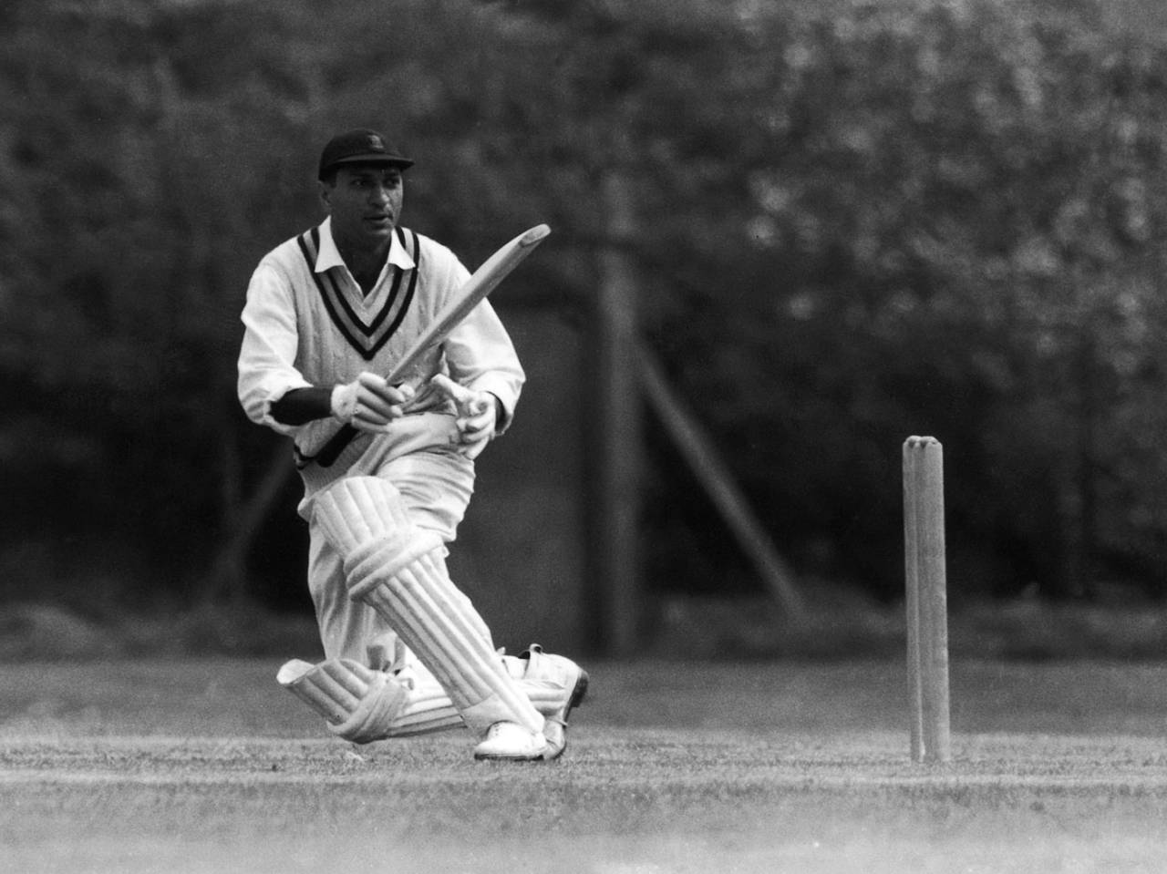 Polly Umrigar bats at a practice session at Osterley, Middlesex, during India's tour of England, April 23, 1959