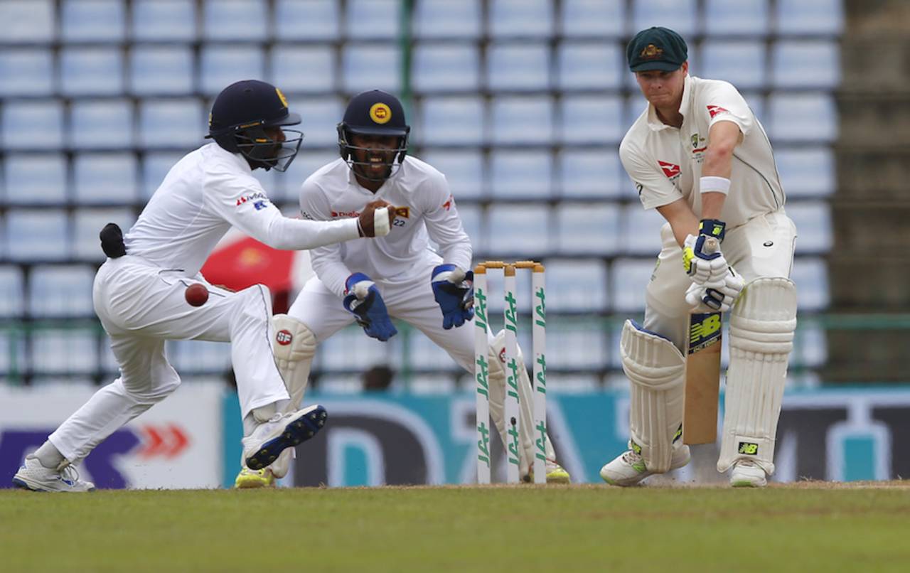 Steven Smith began the fifth day solidly in the company of Adam Voges, after a one-hour rain delay&nbsp;&nbsp;&bull;&nbsp;&nbsp;Associated Press