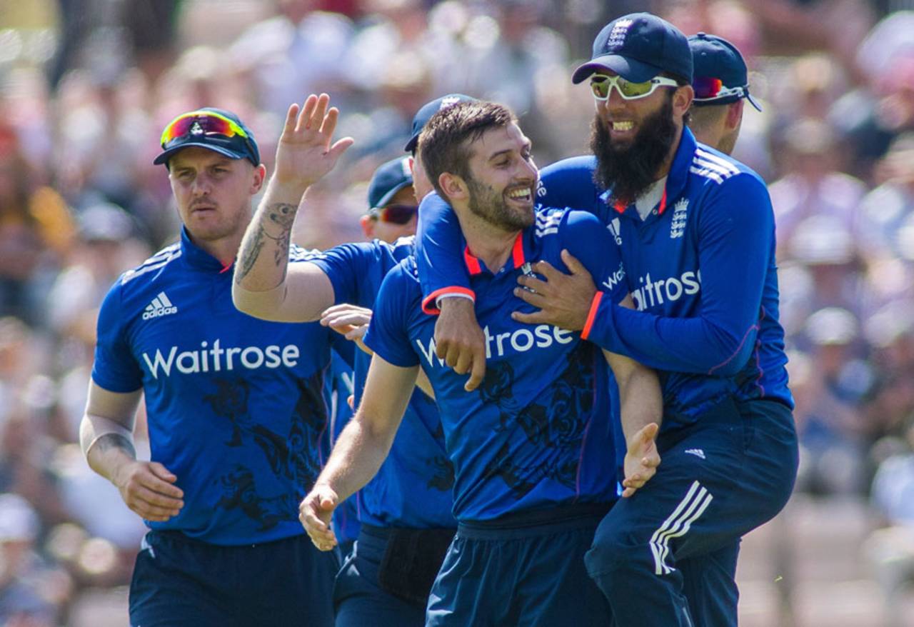 Mark Wood was mobbed by his team-mates after striking on his England comeback, England v Pakistan, 1st ODI, Ageas Bowl, August 24, 2016