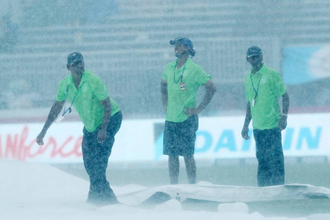 The groundstaff is at work as rain lashes Lauderhill, India v West Indies, 2nd T20I, Florida, August 28, 2016